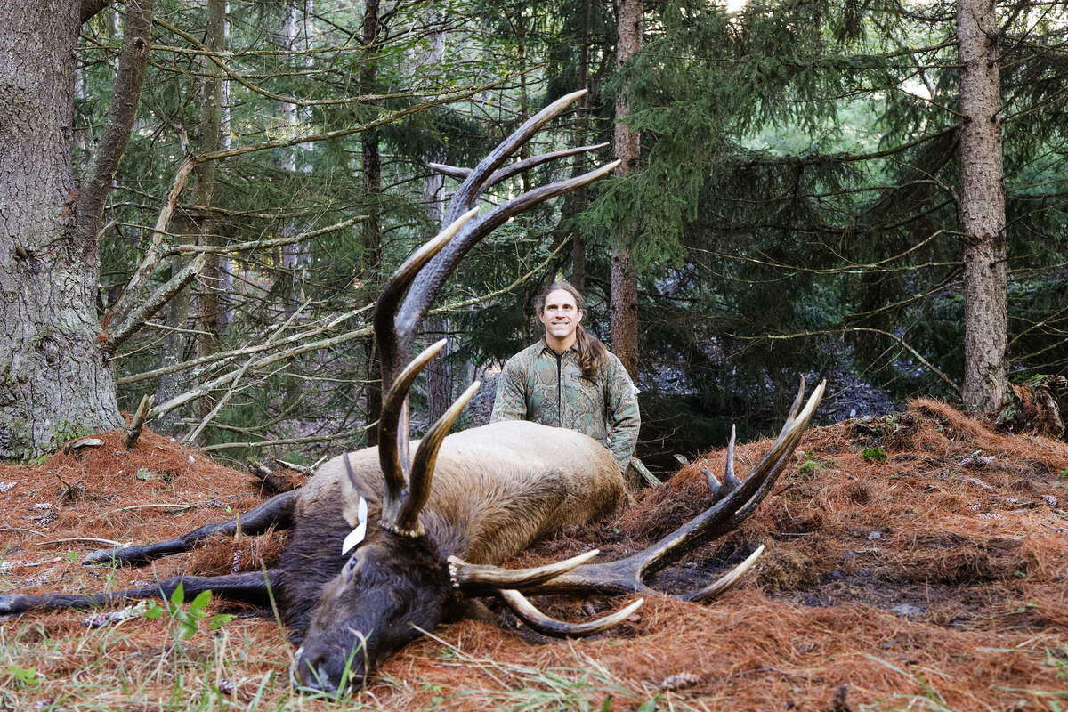 Centre County hunter Mike Skvarla poses with the potential record elk.